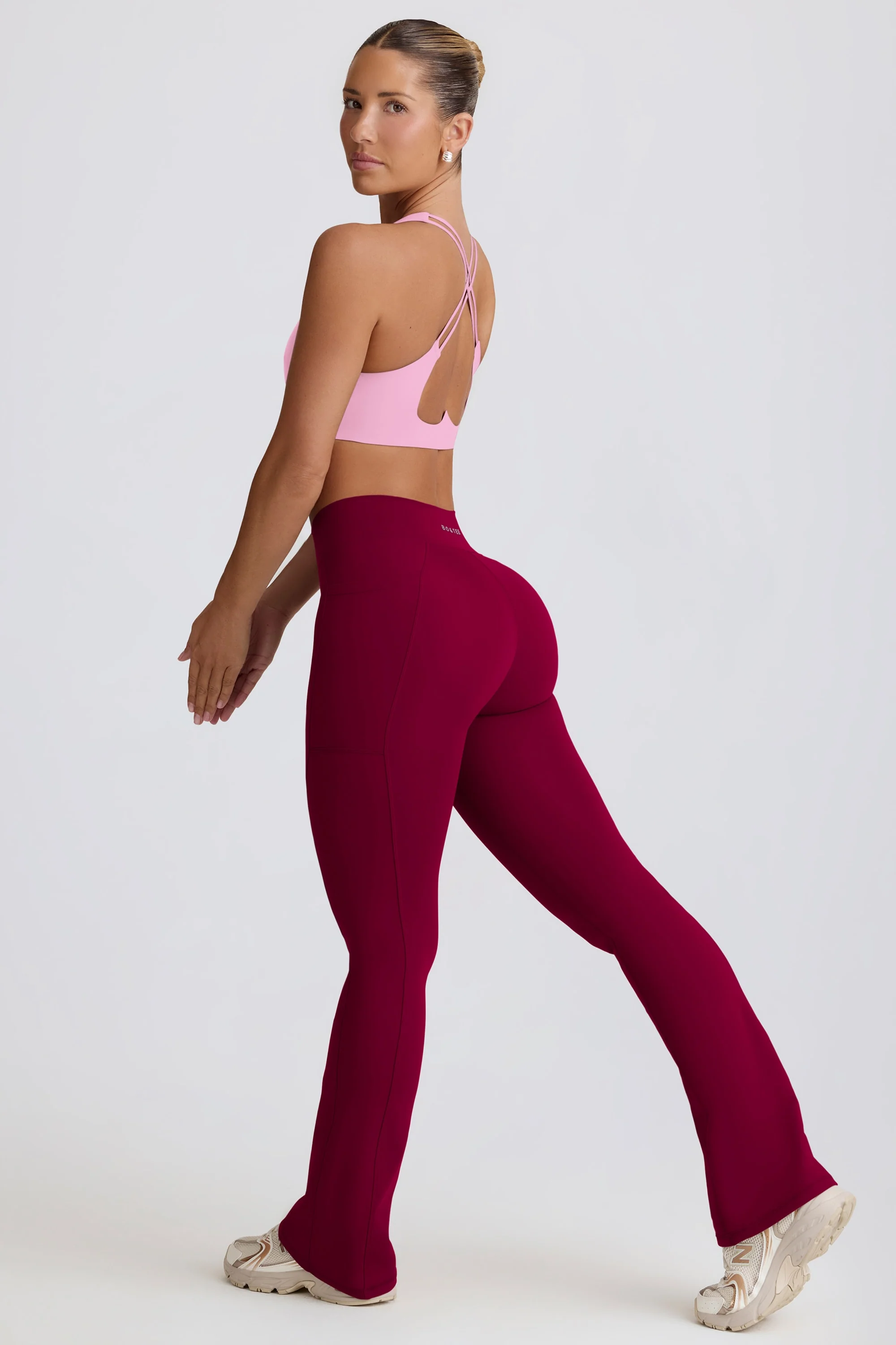 Soft Active Crossover Flared Trousers in Burgundy