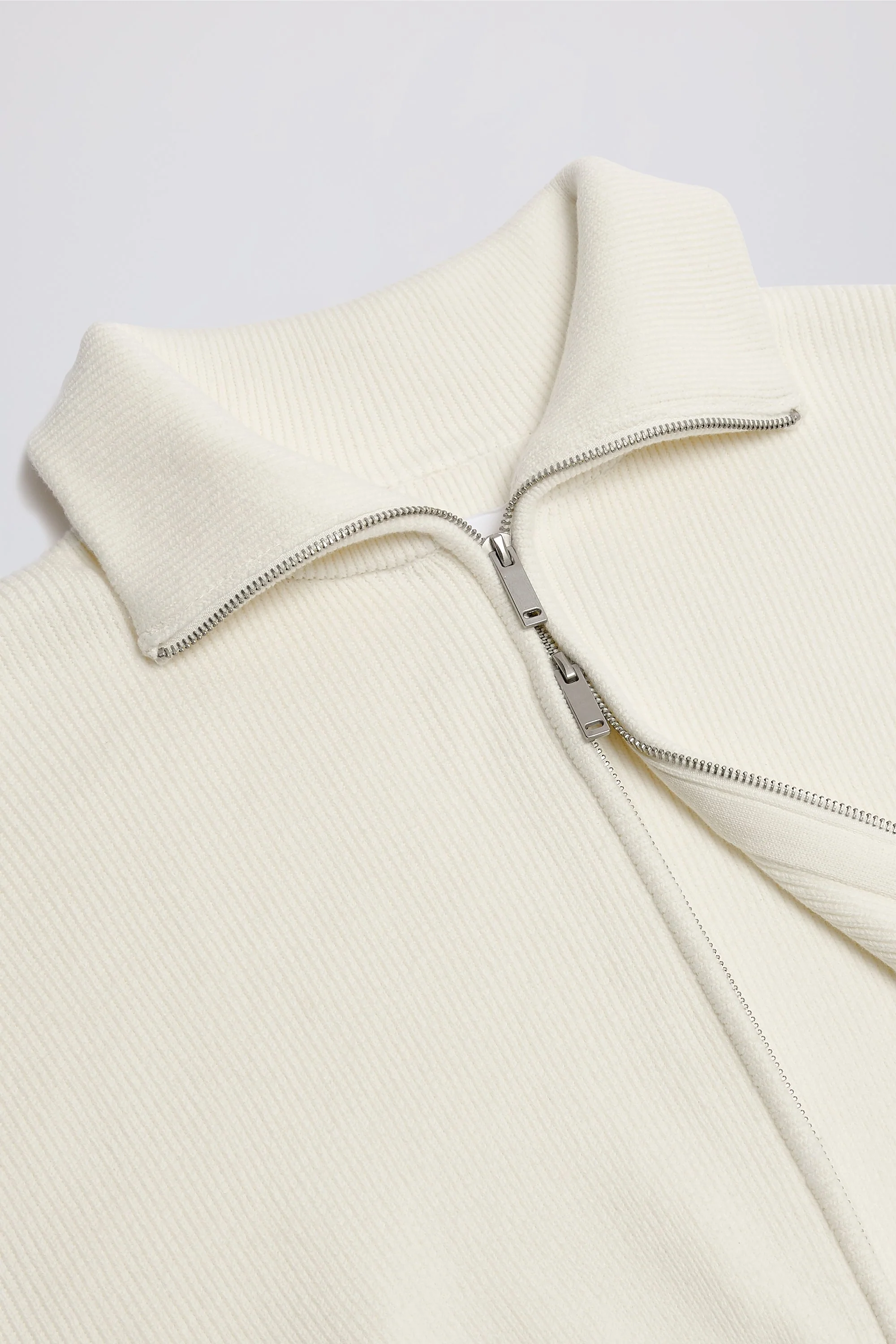 Ribbed-Knit Cropped Zip-Up Sweatshirt in Ivory