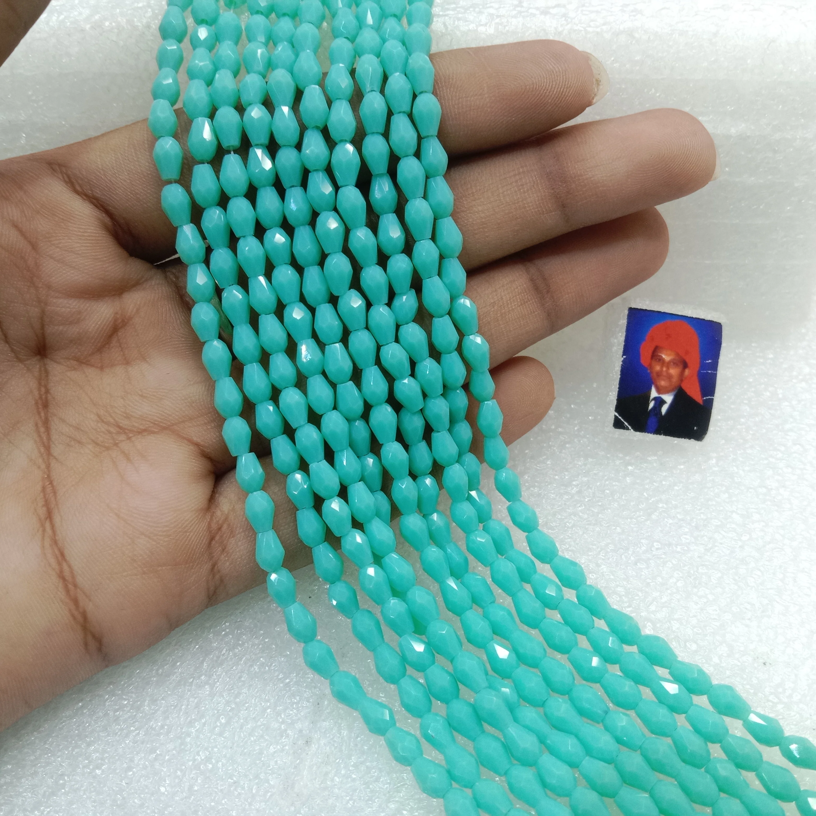 high quality sea green small drop shape crystal beads 3x4mm 1 string