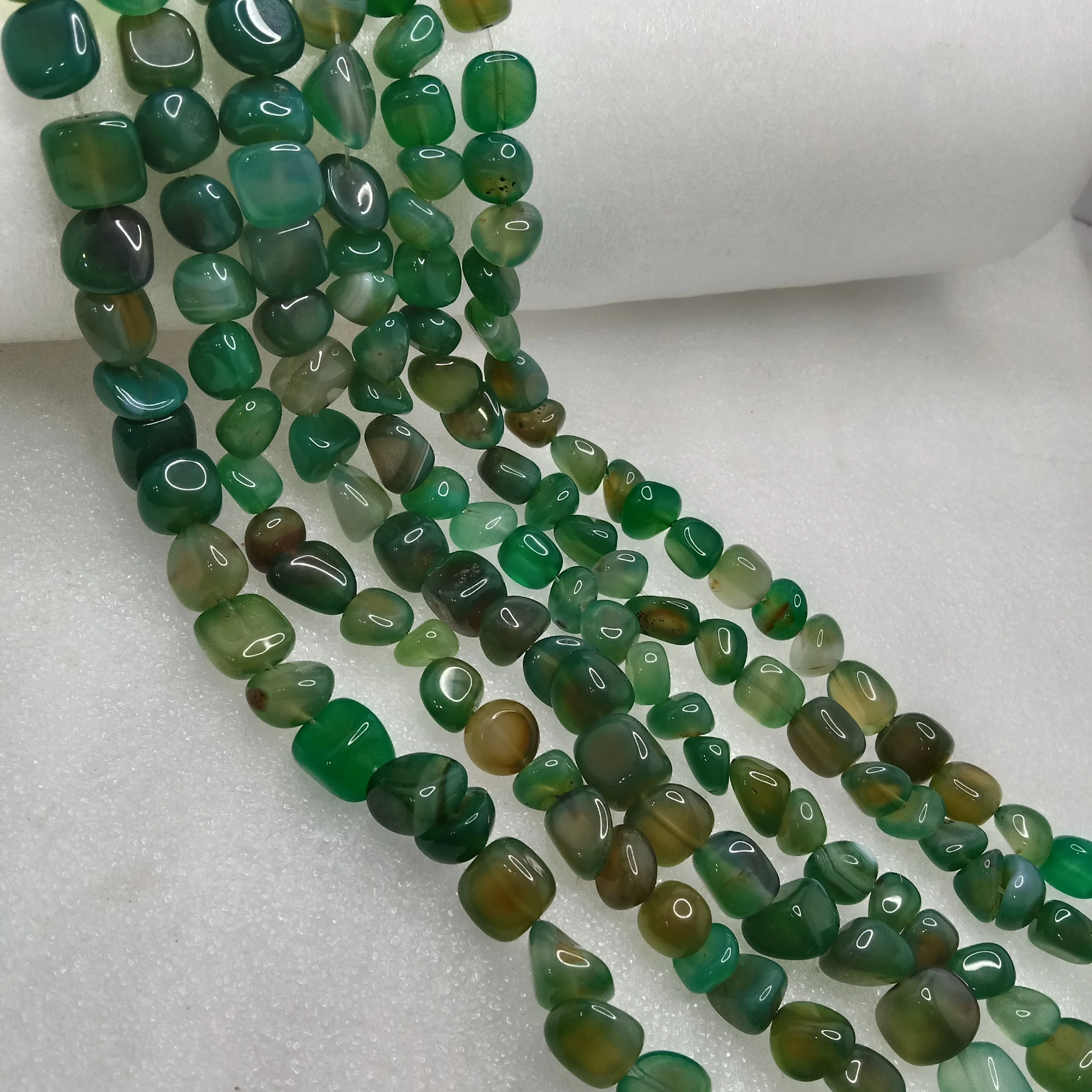 Shaded green tumblestone beads