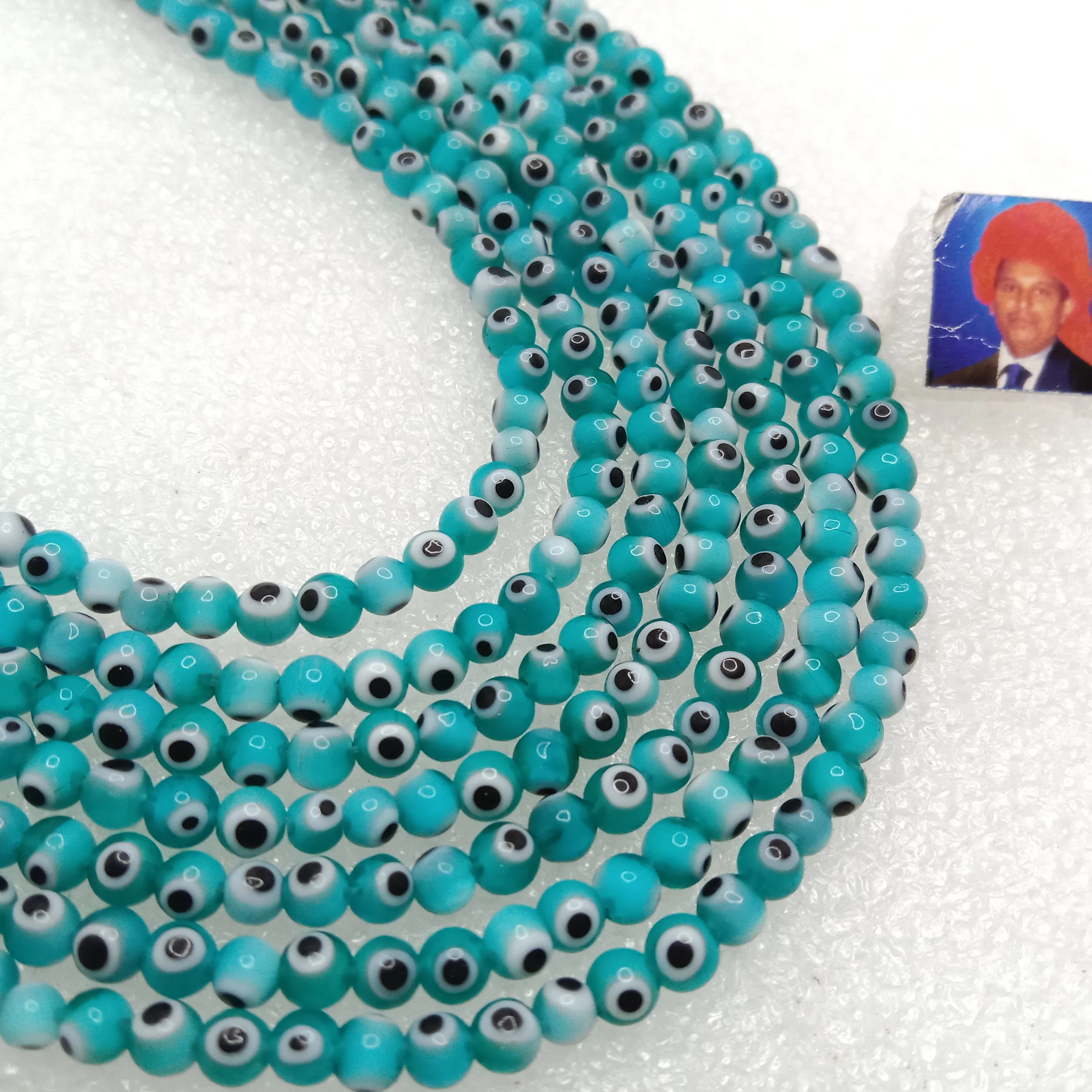 Sea green Evil eye round shape beads 4mm 1 string