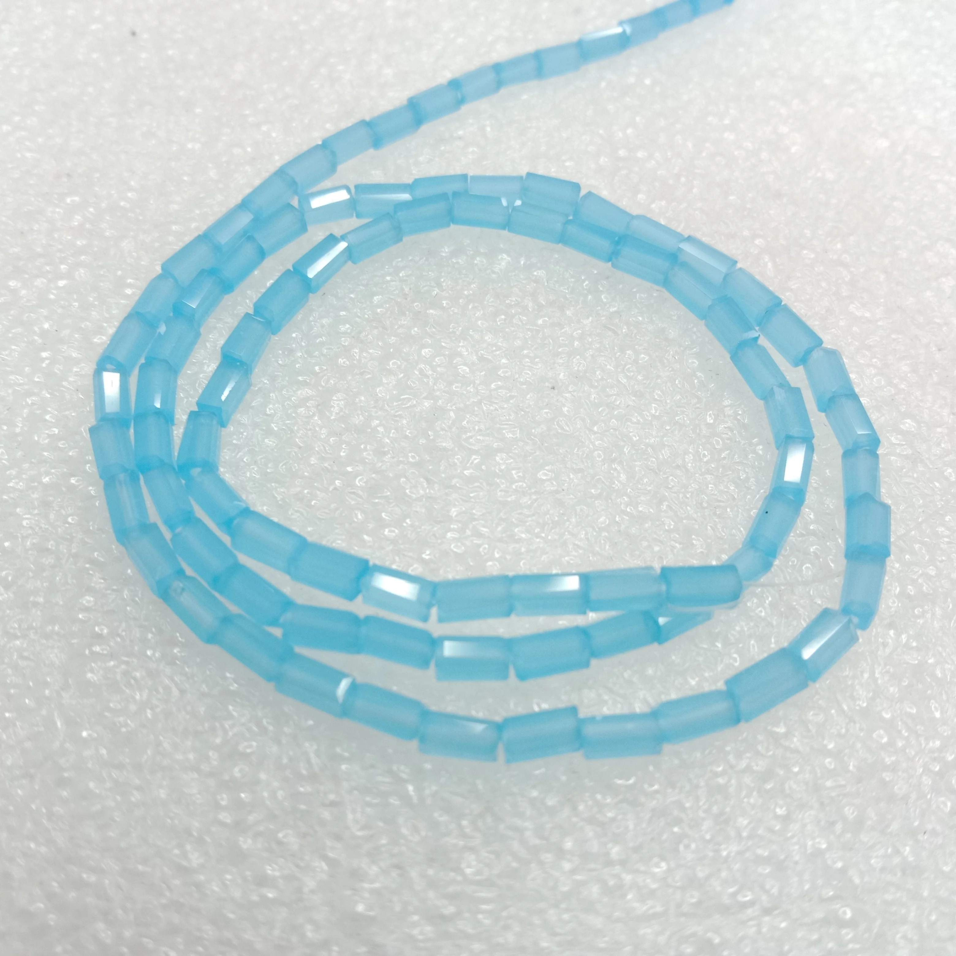 high quality light blue Retargel shape  crystal beads 3x6mm 1 string