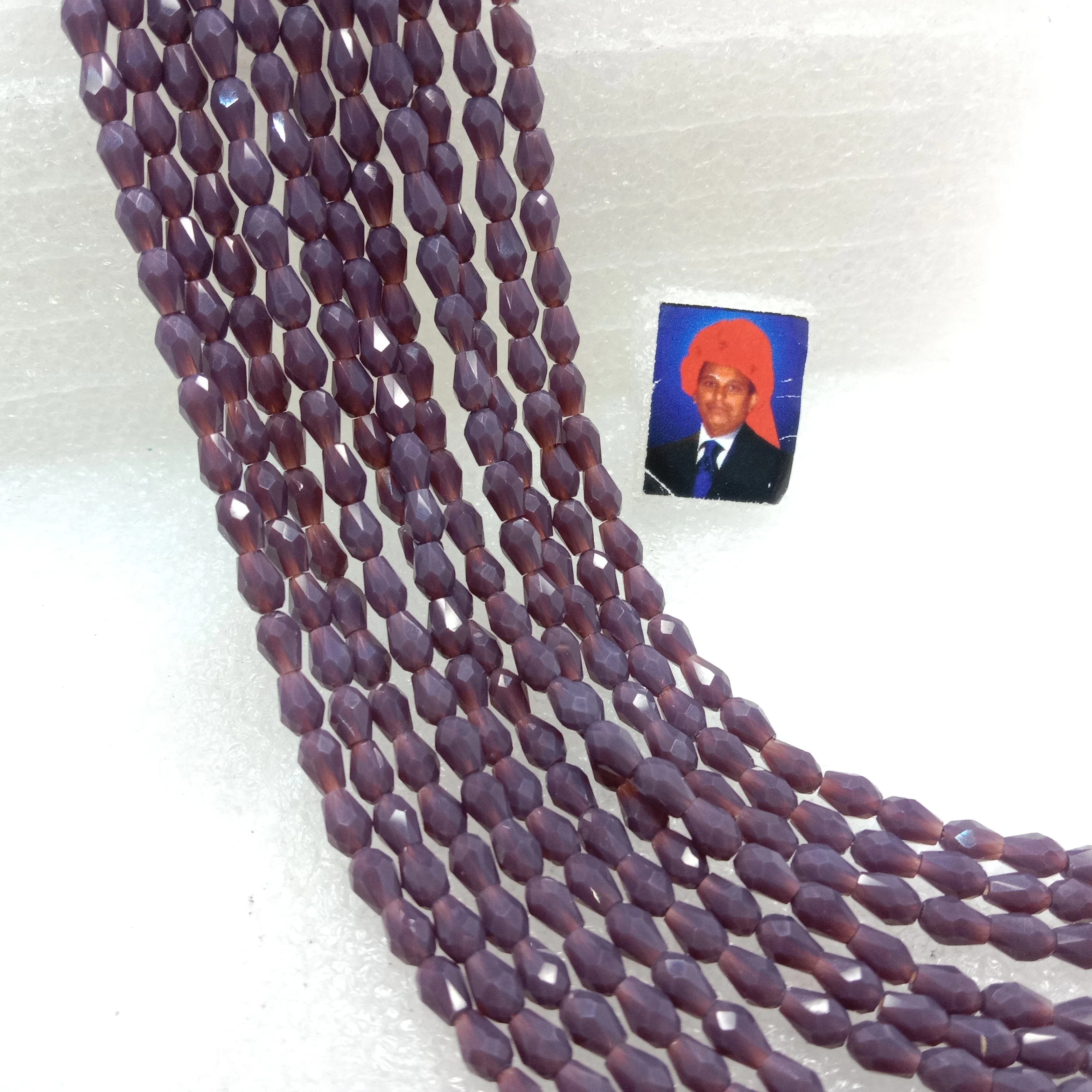 high quality dark purple small drop shape crystal beads 3x4mm 1 string