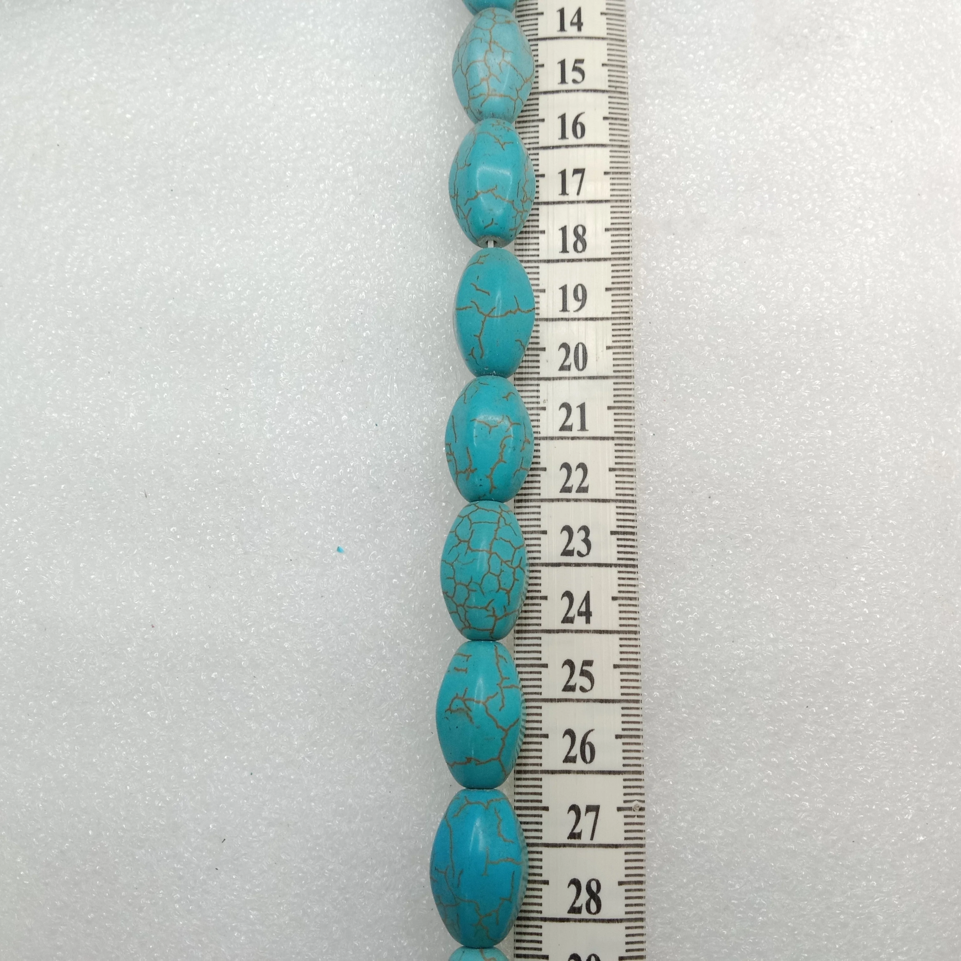 Oval shaped turquoise beads 1 string