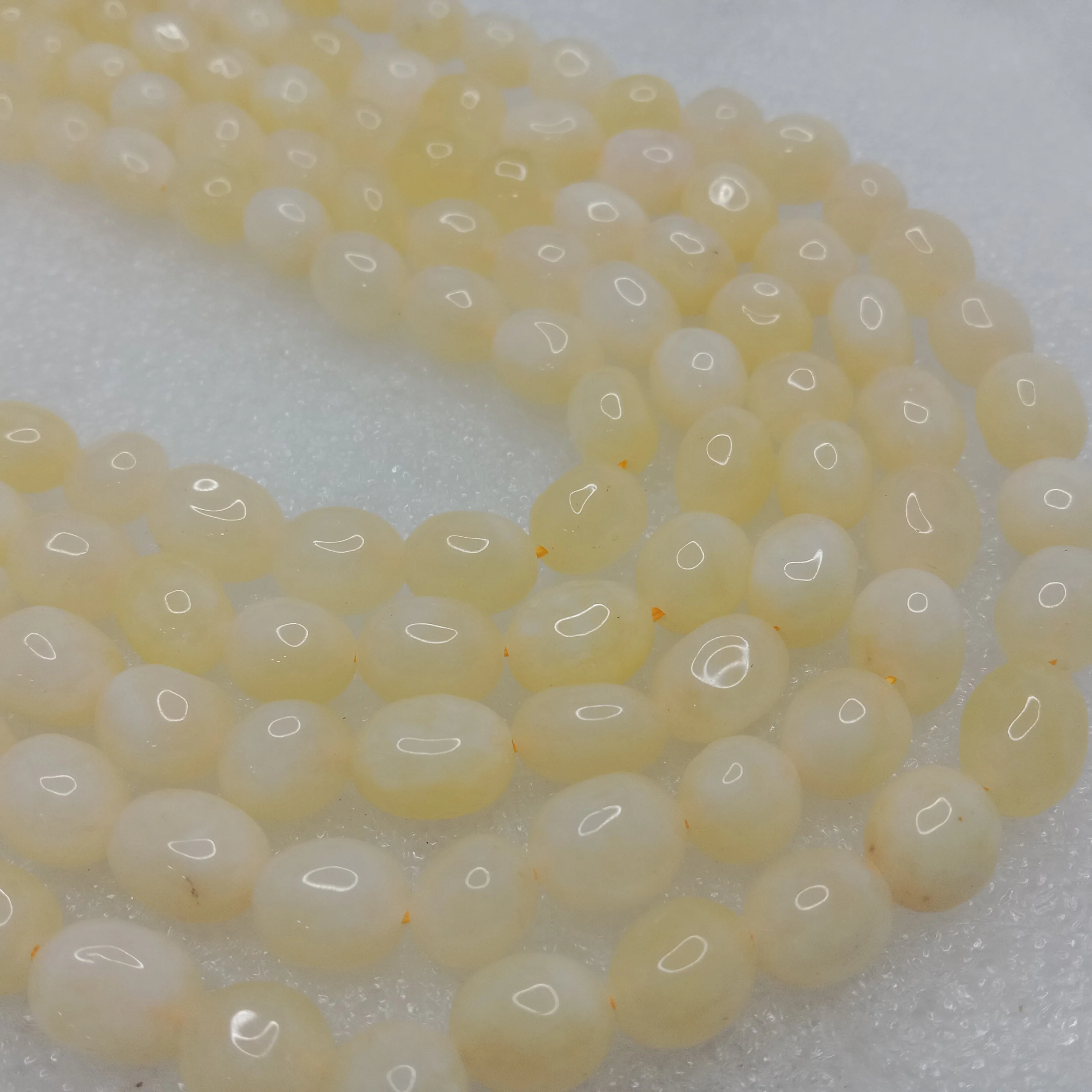 Light yellow High quality tumble duldul stone beads 1 string