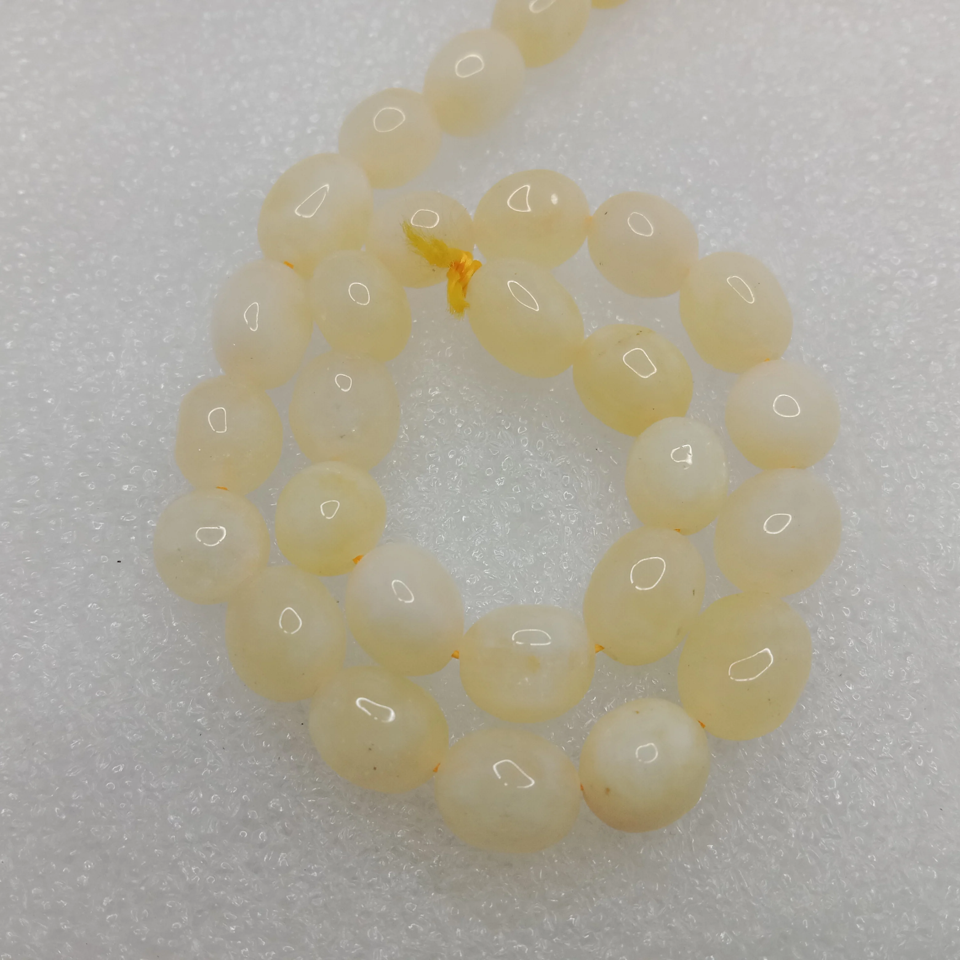 Light yellow High quality tumble duldul stone beads 1 string