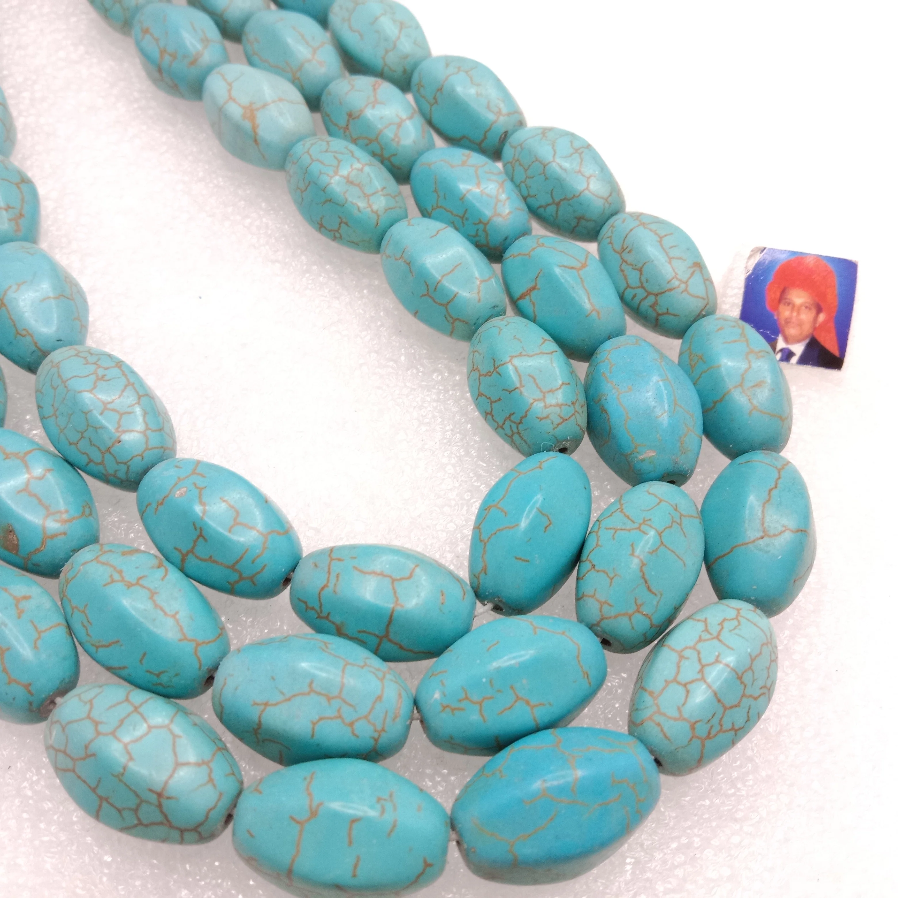 Oval shaped turquoise beads 1 string