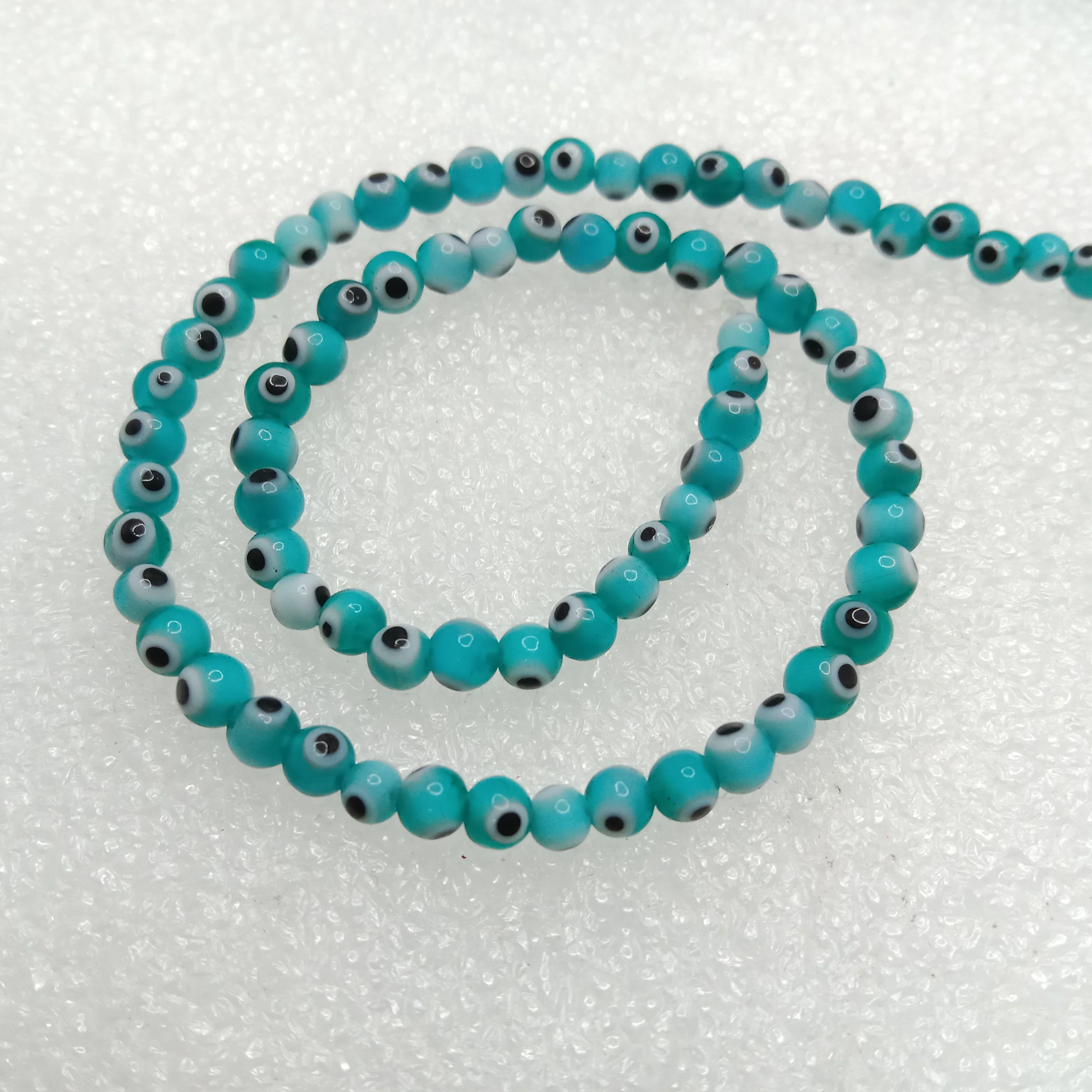 Sea green Evil eye round shape beads 4mm 1 string