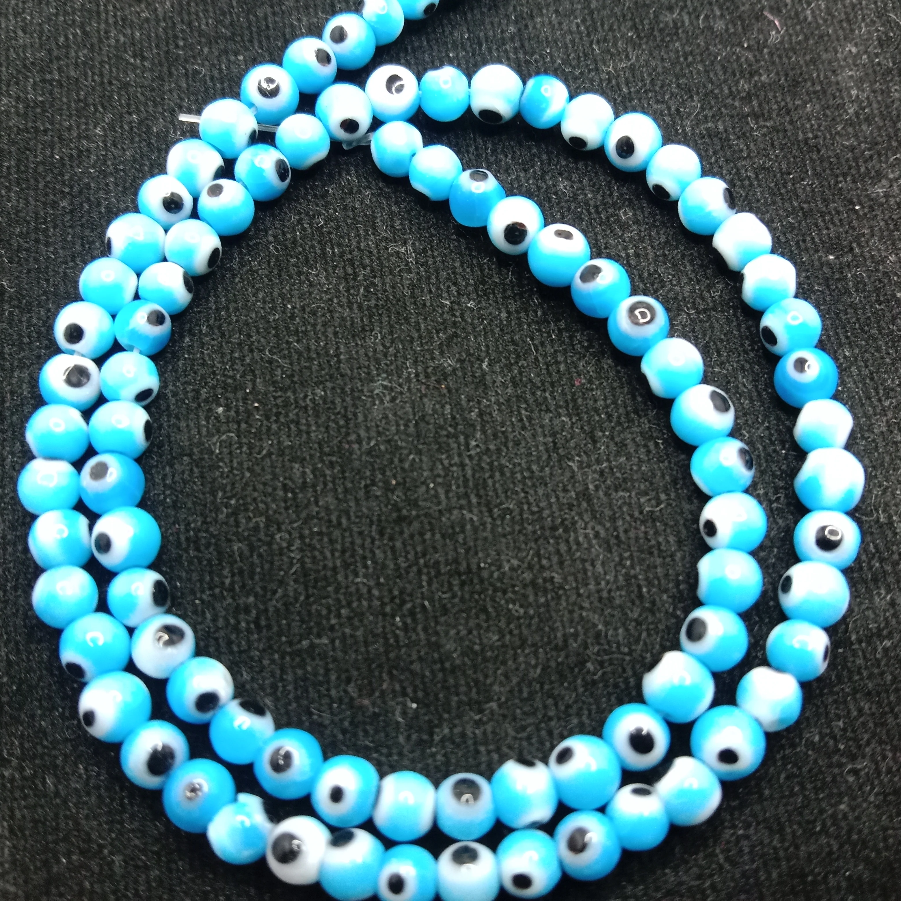 Light blue Evil eye round shape beads 4mm 1 string