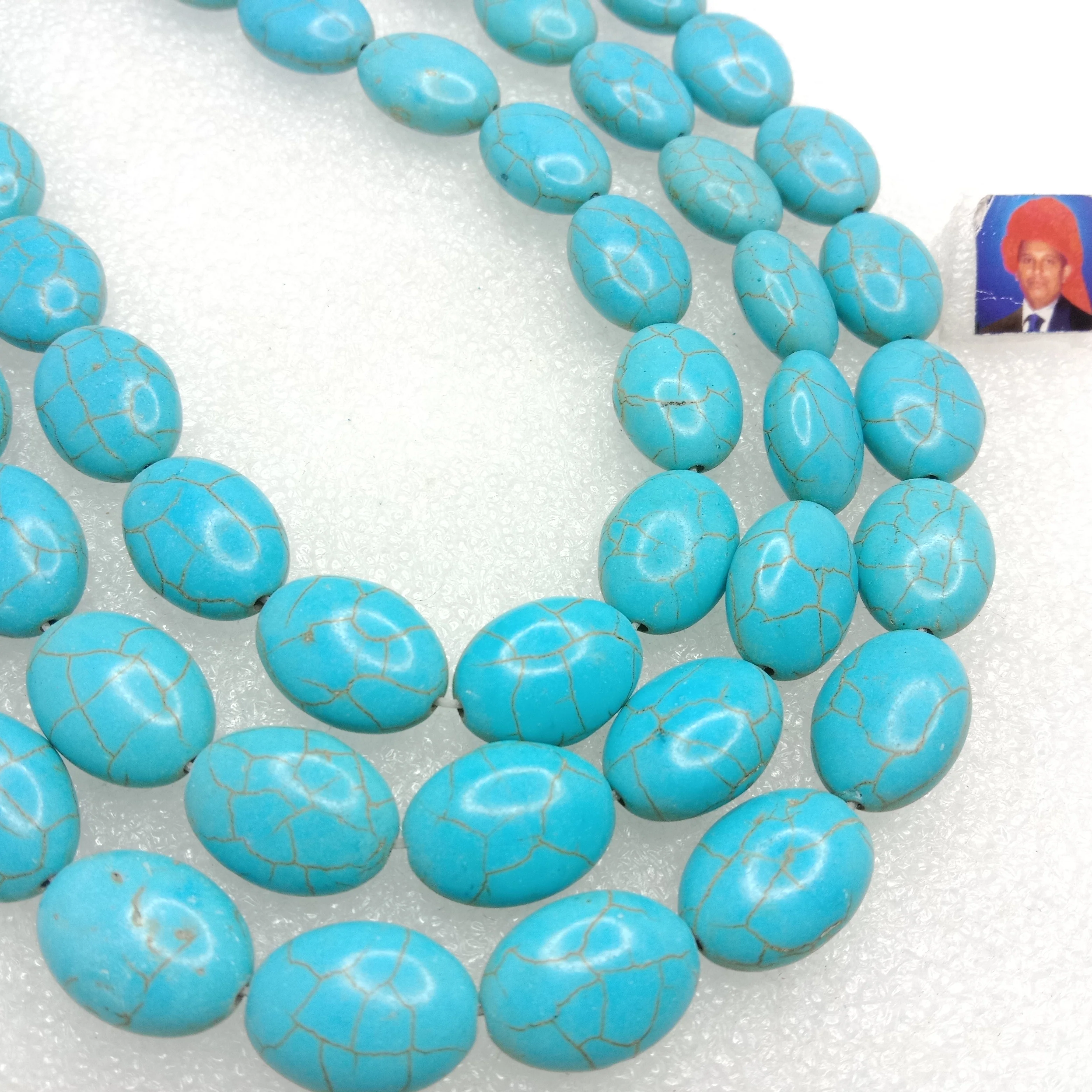 Flat oval shape turquoise beads 1 string