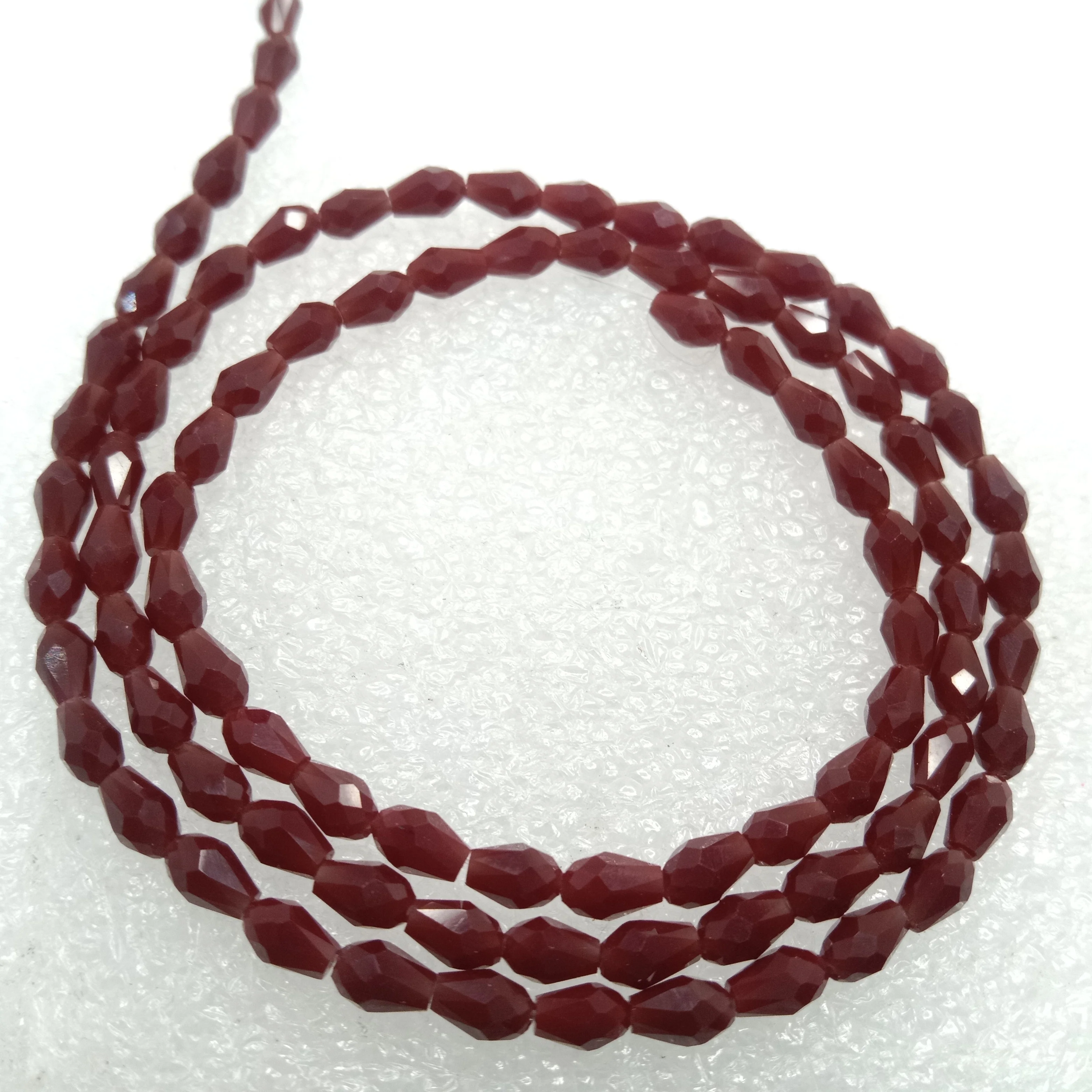 high quality dark red small drop shape crystal beads 3x4mm 1 string