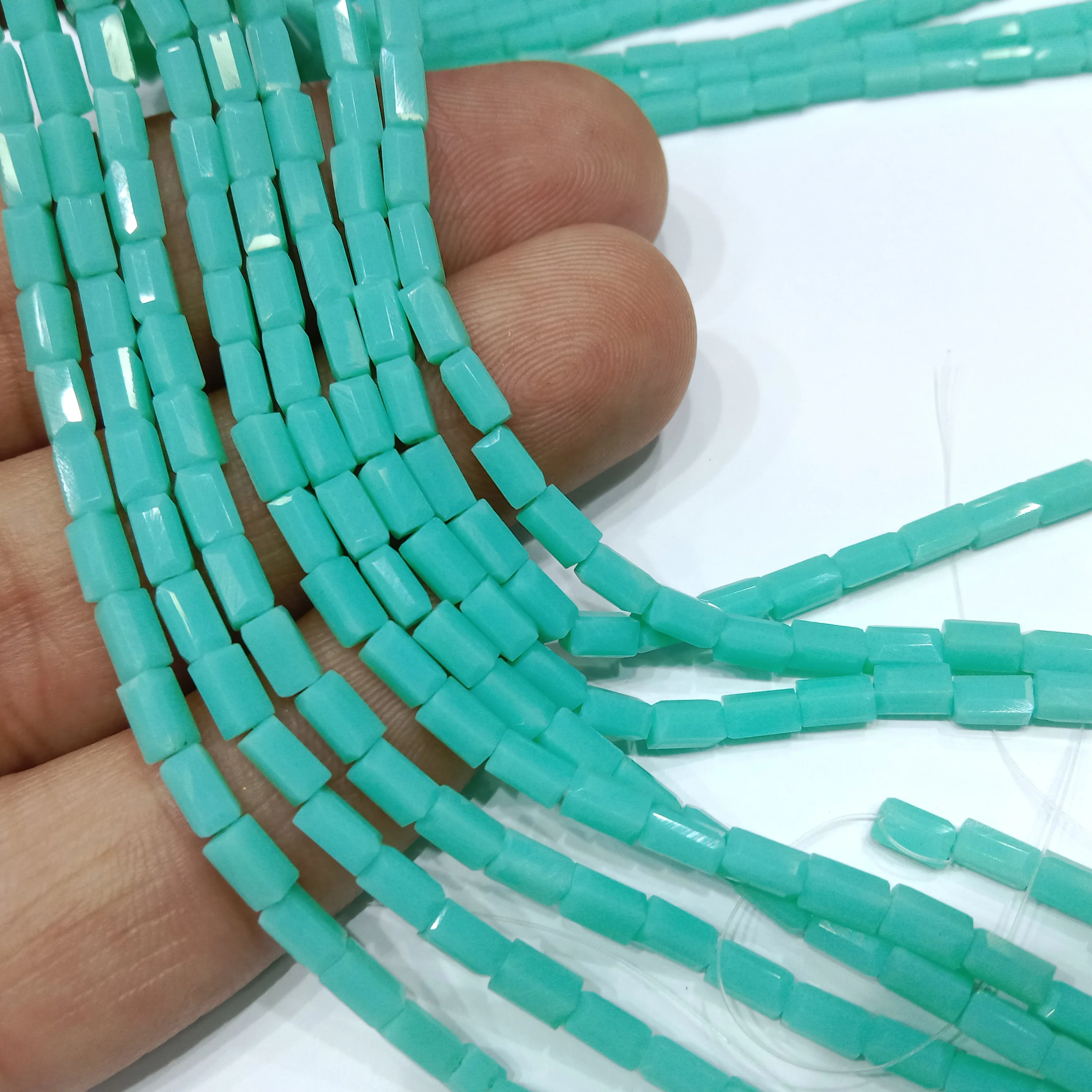 high quality sea green Retargel shape crystal beads 3x6mm 1 string