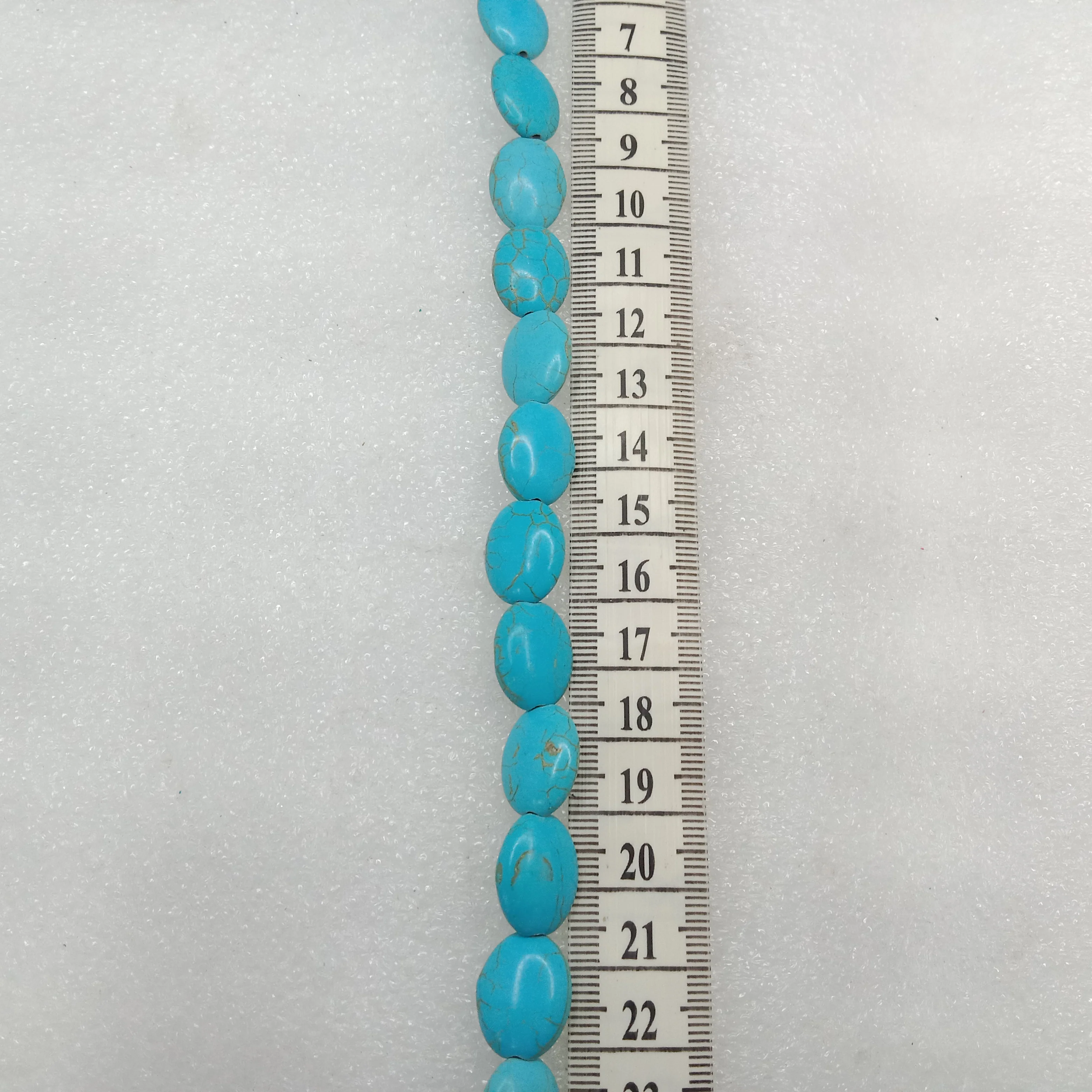 Small flat oval shape turquoise beads 1 string