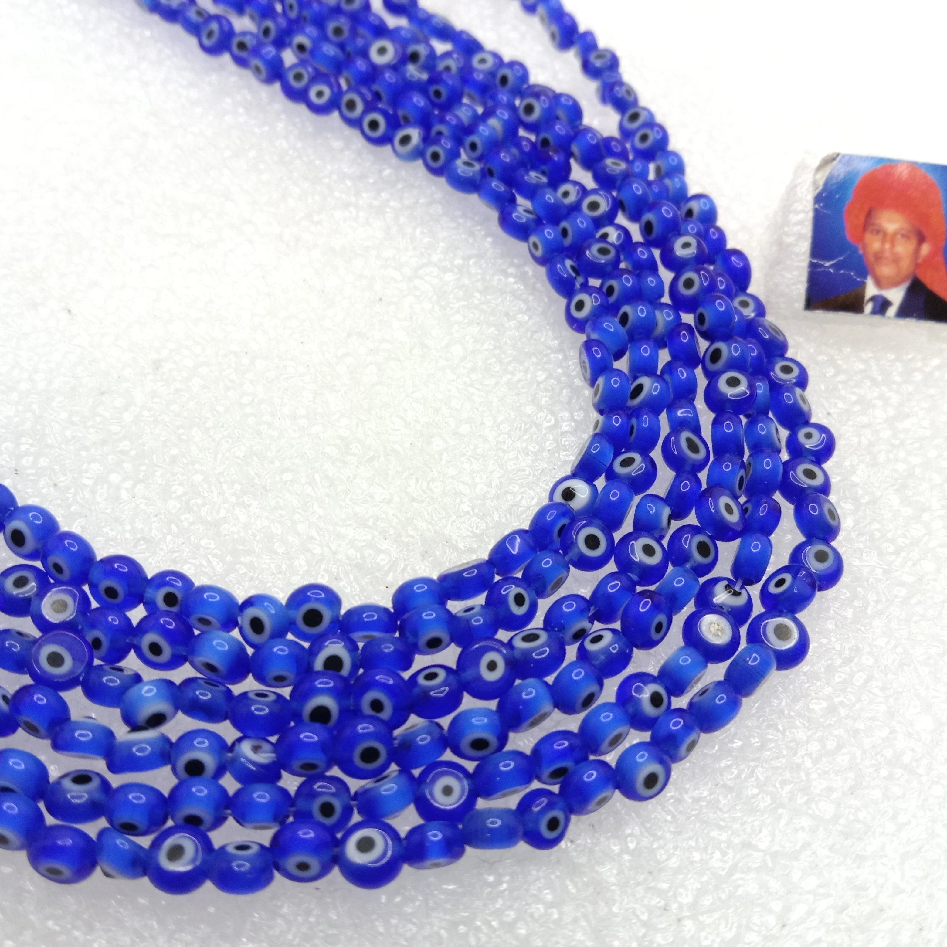 Dark blue Evil eye flat shape beads 4mm 1 string