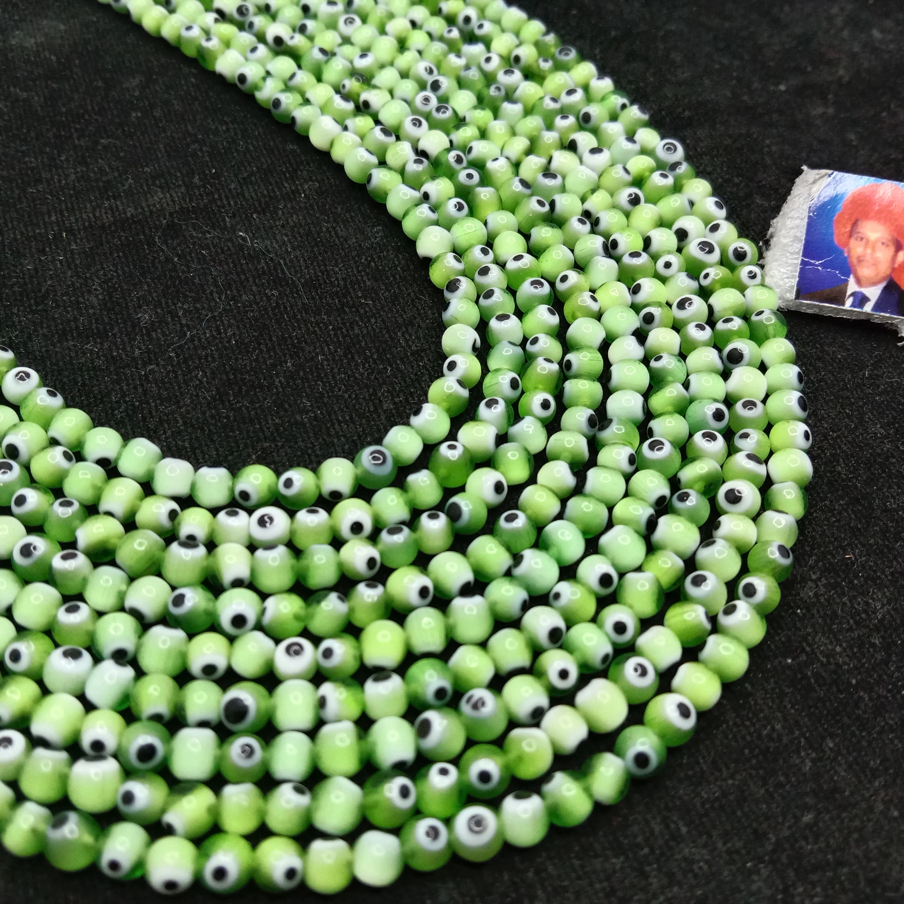 Light green Evil eye round shape beads 4mm 1 string