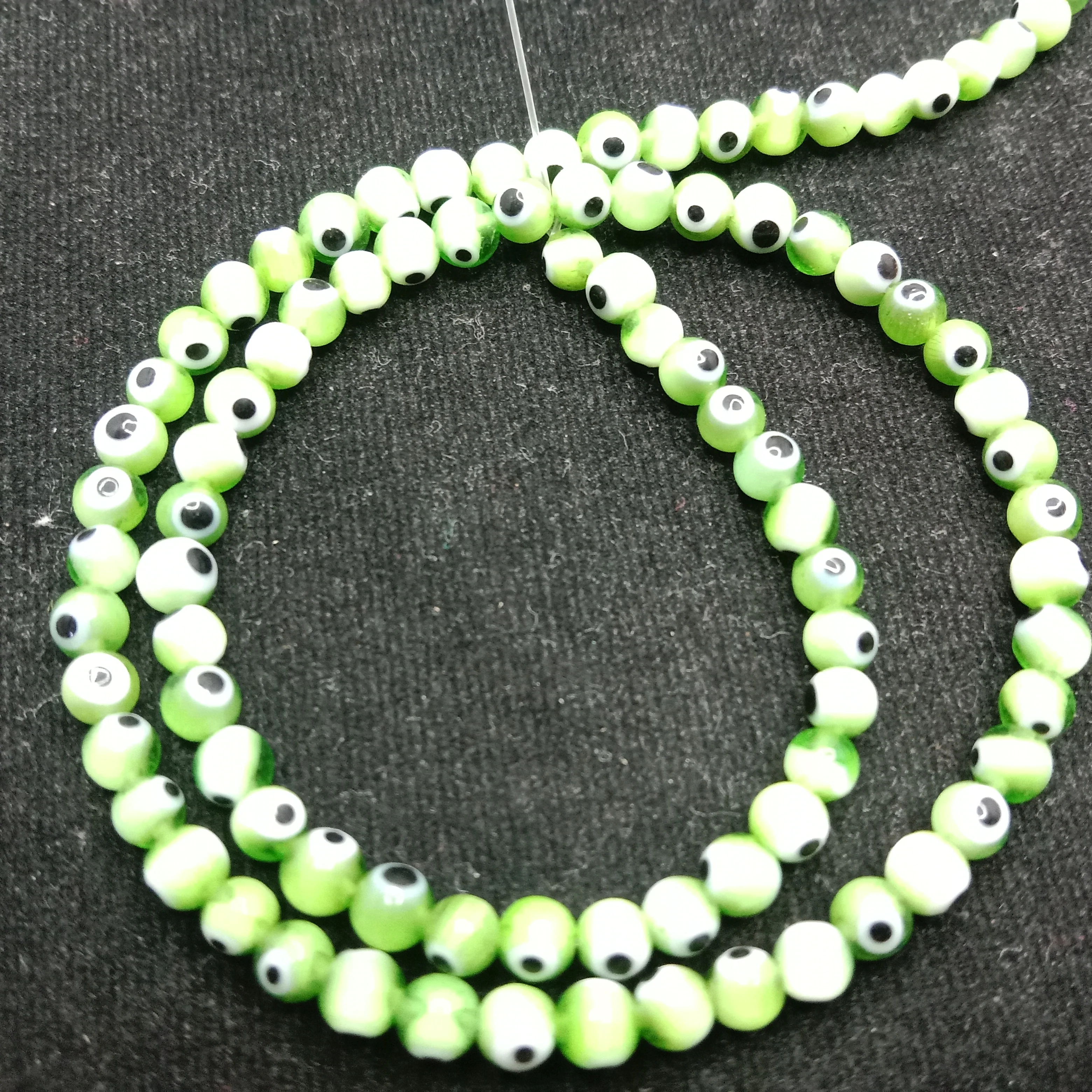 Light green Evil eye round shape beads 4mm 1 string