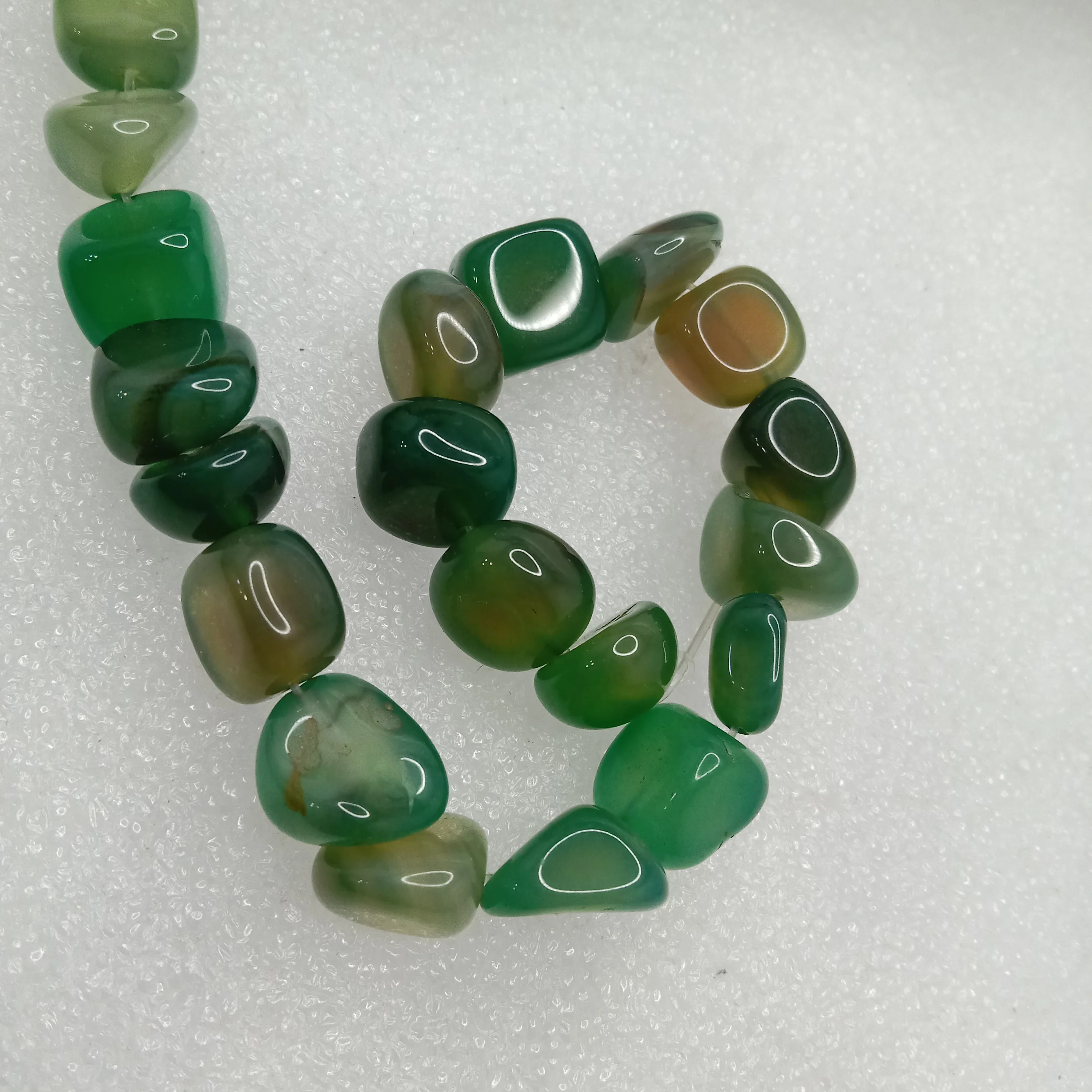 Shaded green tumblestone beads