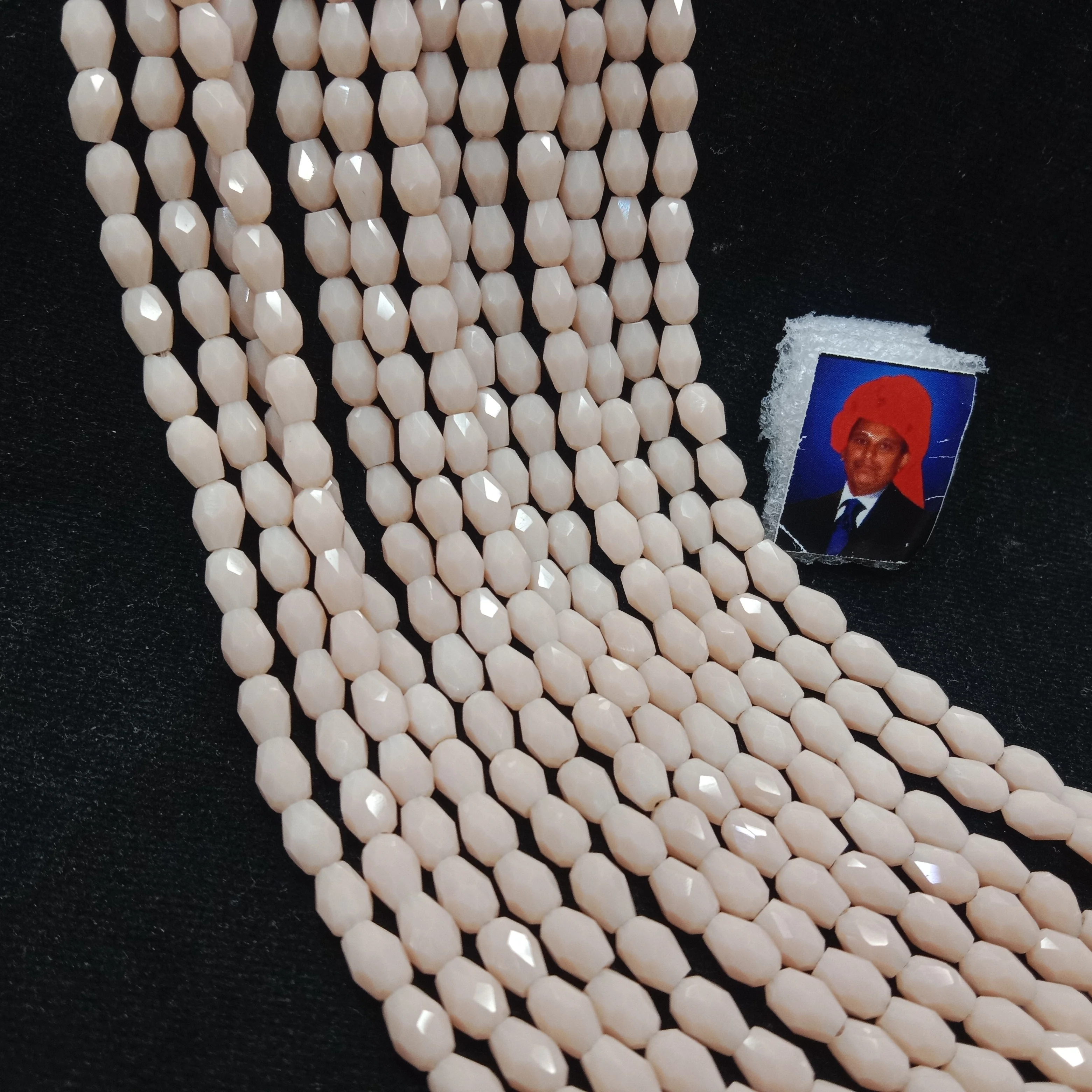 high quality drop shape cream colour crystal beads 4x4mm 1 string