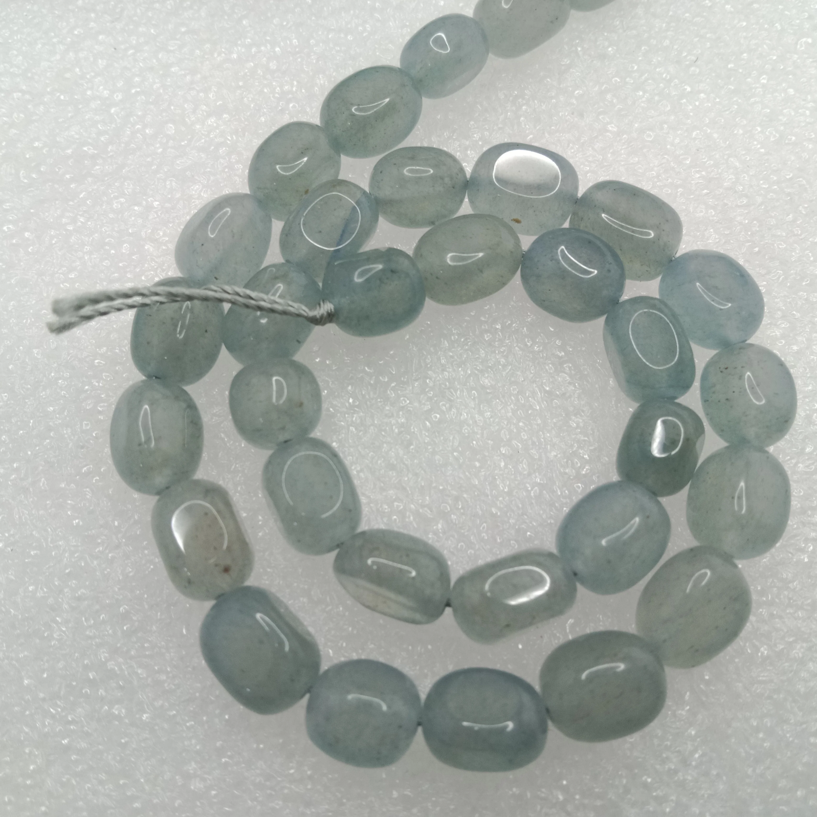 Grey High quality tumble stone beads 1 string(8x11mm)