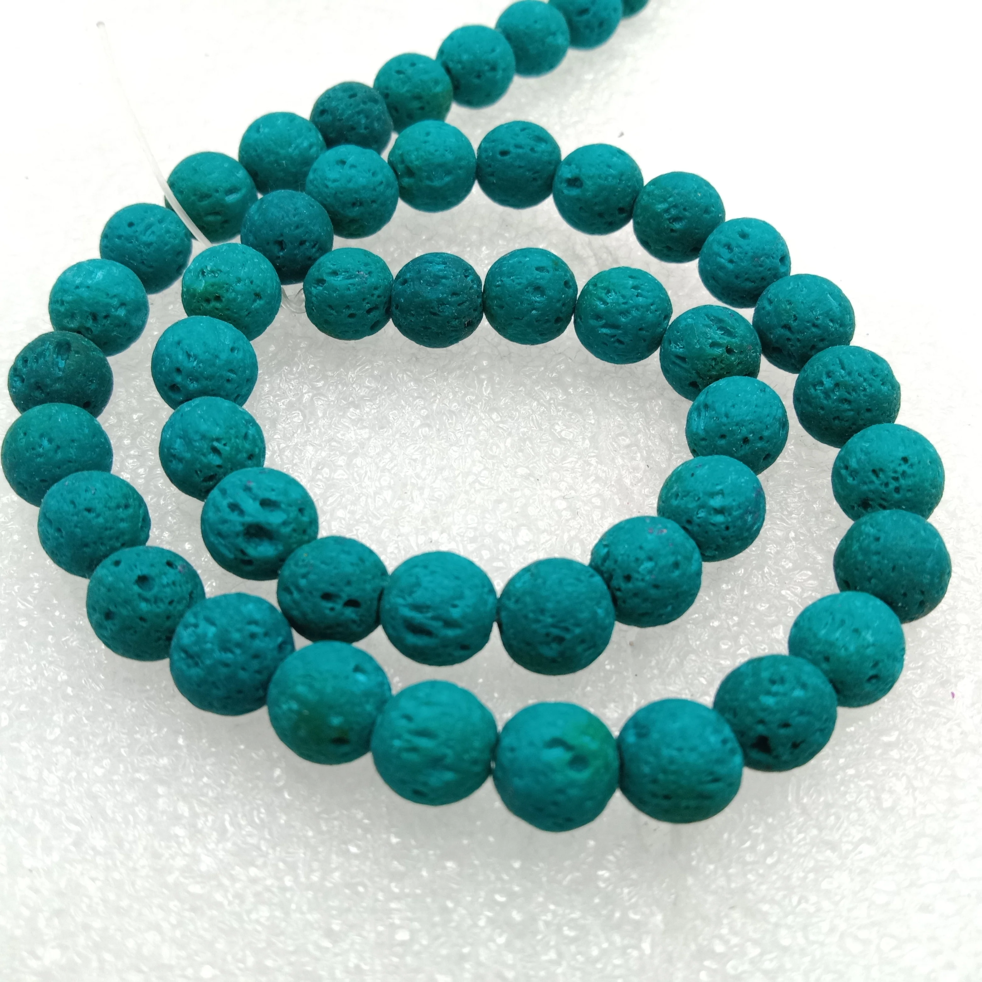 Turquoise round shape lava beads 8 mm 1 string