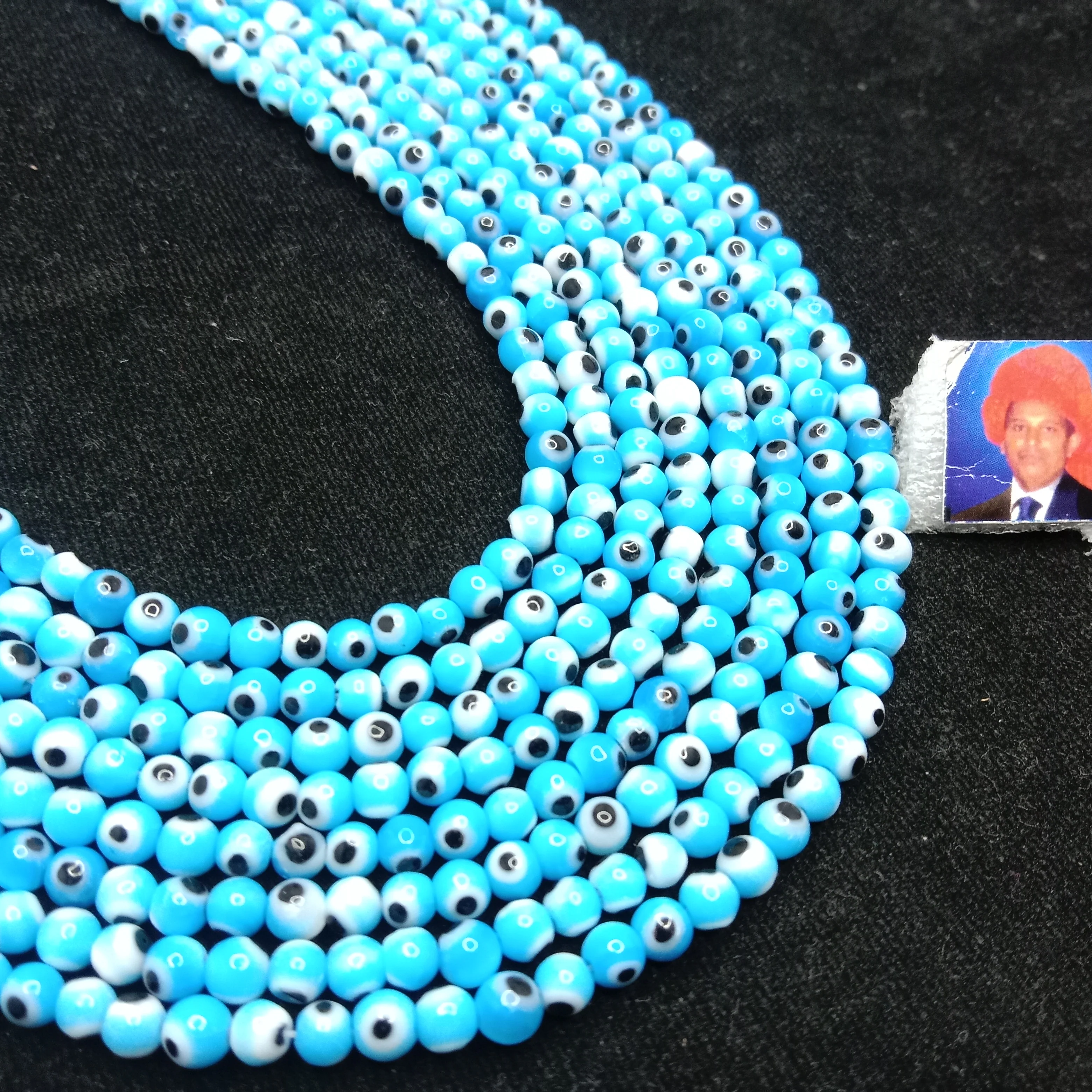 Light blue Evil eye round shape beads 4mm 1 string